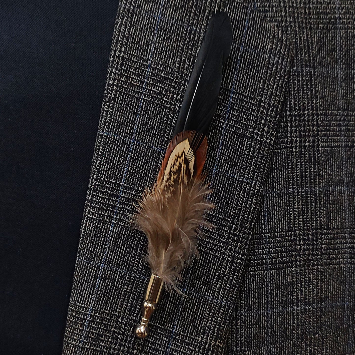 Black feather pin