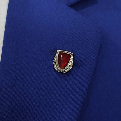 Red broach