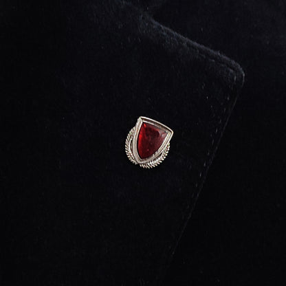 Red broach